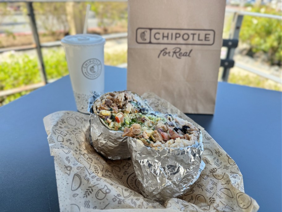 A Chipotle burrito cut in half.