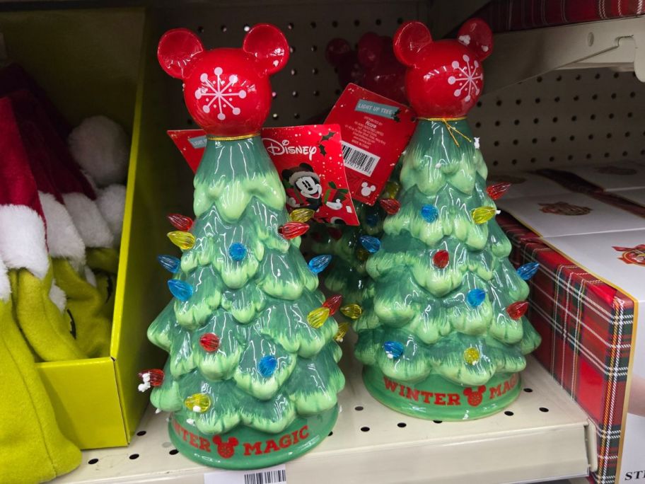 Disney Mickey LED Light-Up Christmas Trees on shelf in store