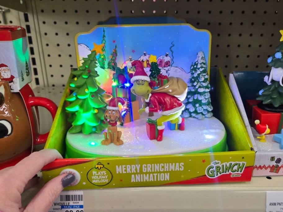 Dr Seuss's The Grinch Merry Grinchmas Animated Scene on shelf in store