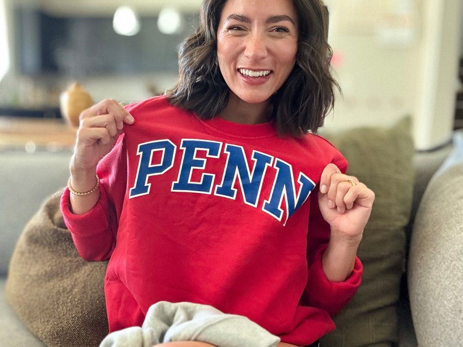woman wearing penn sweatshirt