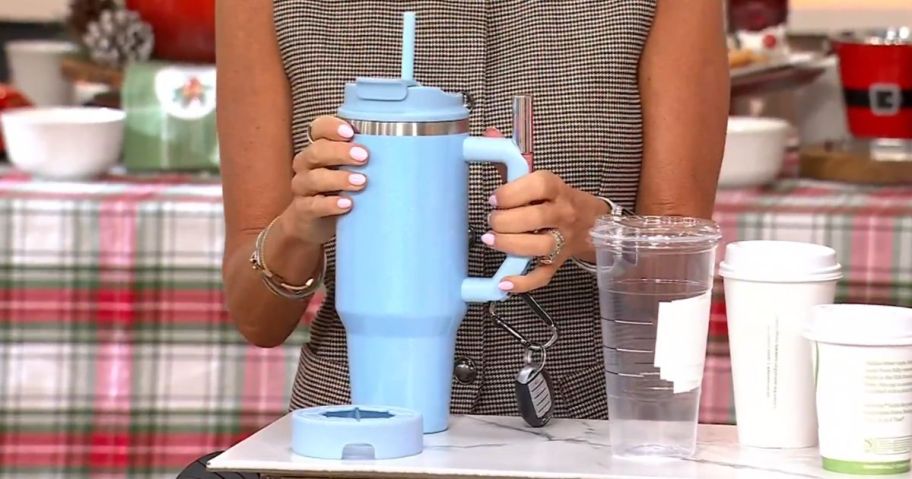 woman holding blue Frost Buddy 40-oz Thicc Buddy