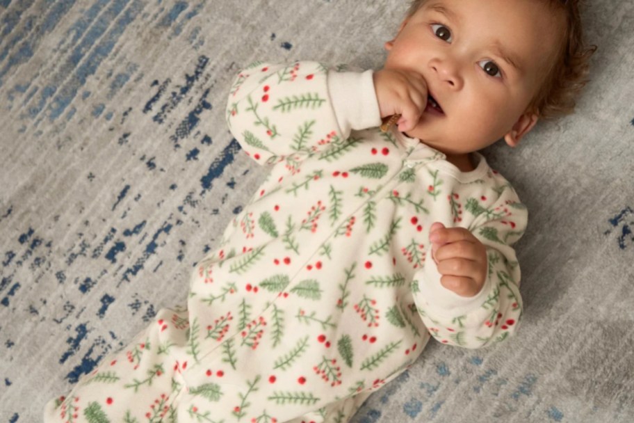 baby in mistletoe footed pajamas