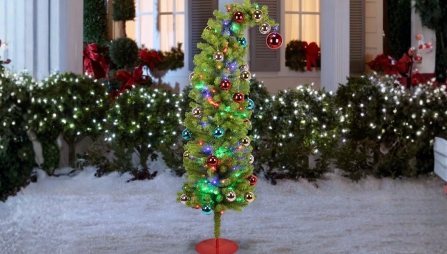 grinch tree in snow outside 