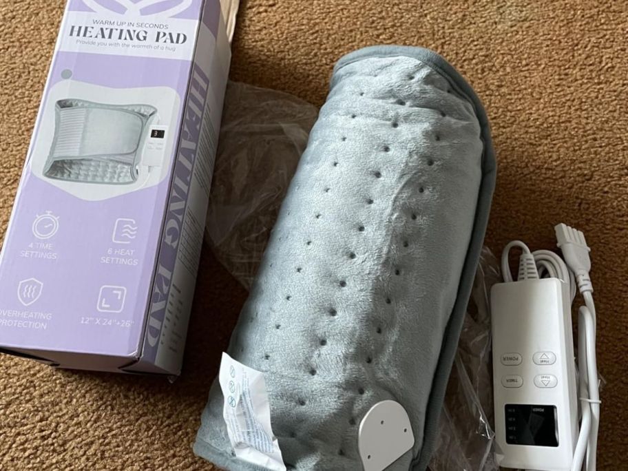 heating pad with items around it 