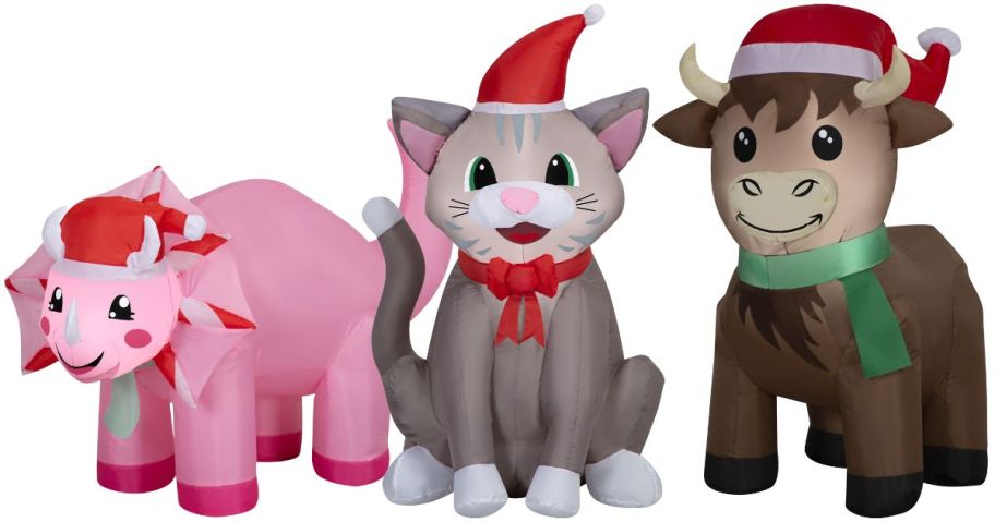 three holiday time christmas inflatables