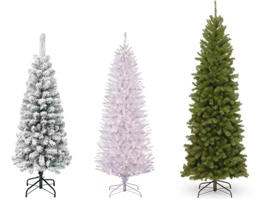 two white and one green christmas trees