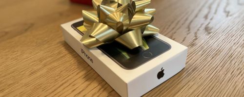 an iPhone Box with a bow on it