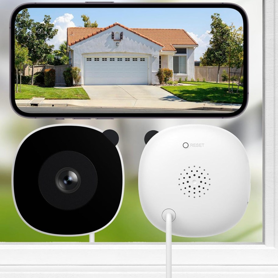 camera facing front and back on window with phone 