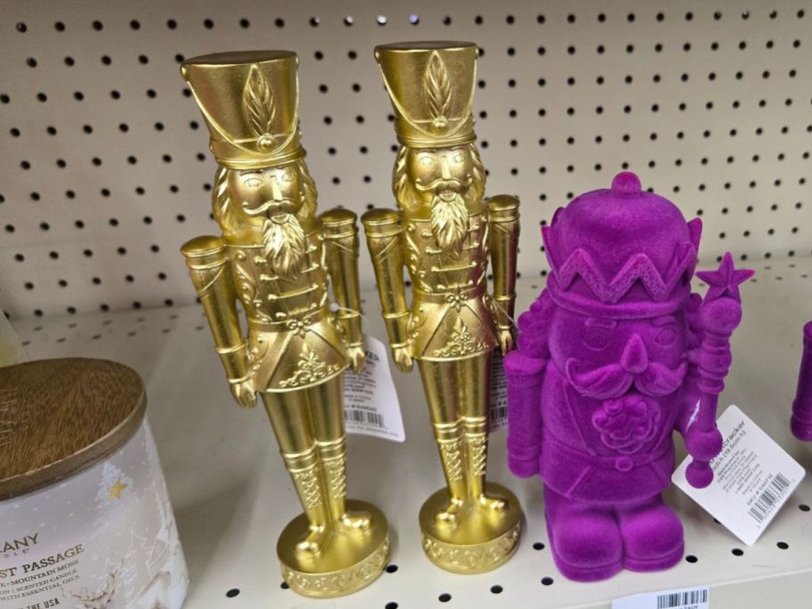 Joyward 10" Gold Nutcracker Figurines on shelf in store