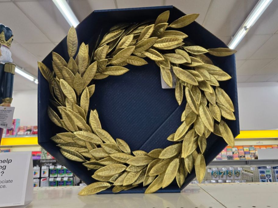 Joyward 22" Gold Leaf Wreath on shelf in store