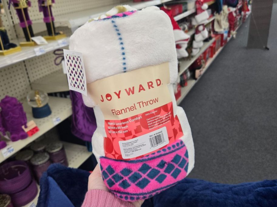 Joyward Flannel Throw Blanket in hand in store