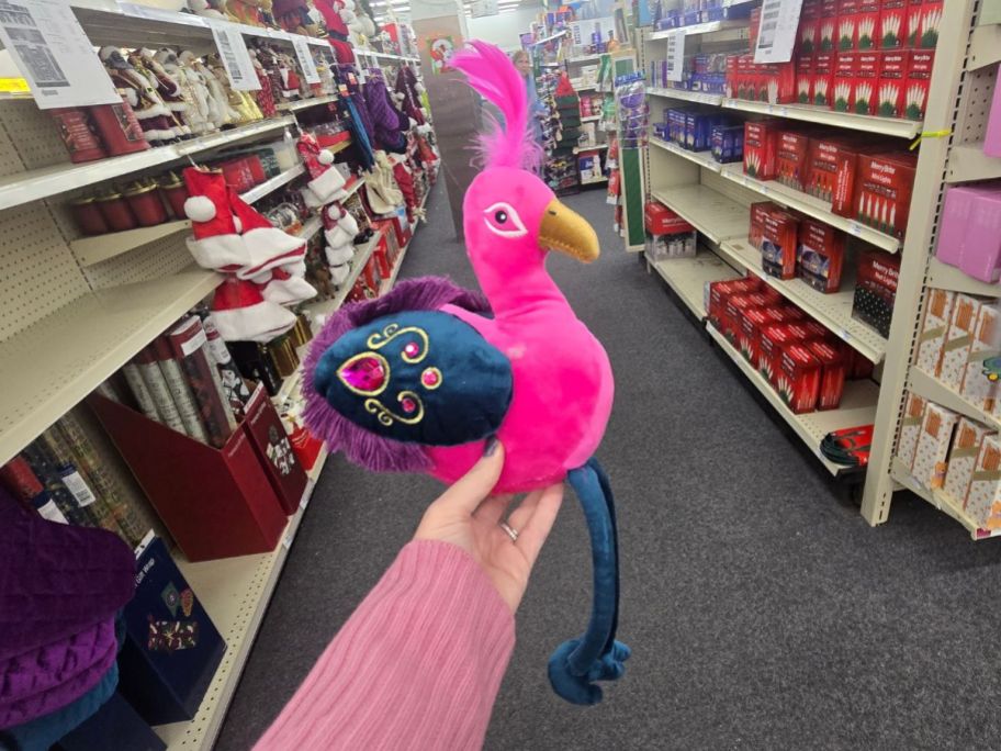 pink Joyward Peacock Sitter in hand in store