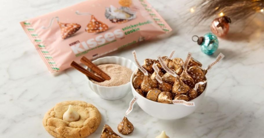 hershey's snickerdoodle cookie kisses bag with bowl full of the candies on table