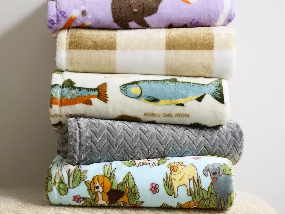 blankets stacked on chair 