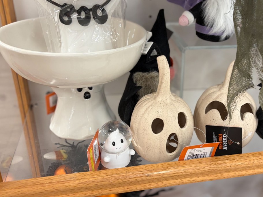 ghost bowl, and pumpkin decor on table