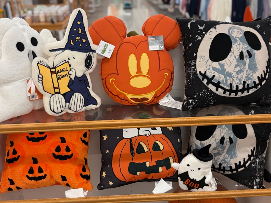 halloween pillows on shelf