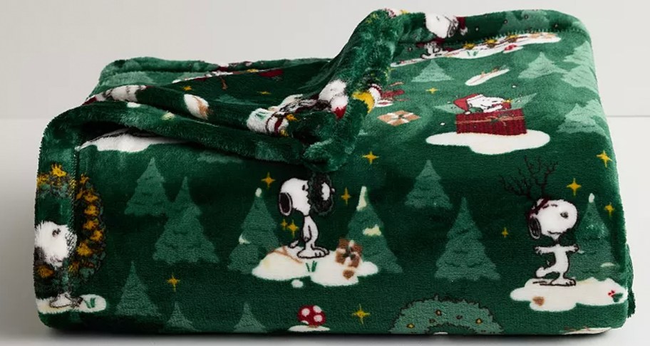 green snoopy holiday blanket 