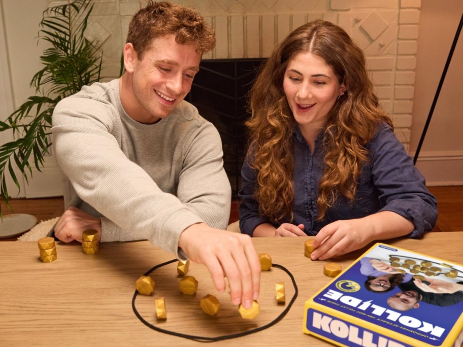 two people playing a tabletop game