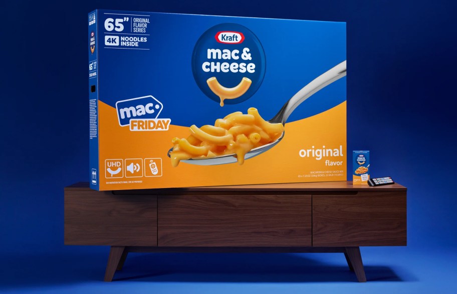 huge box of mac and cheese on tv stand