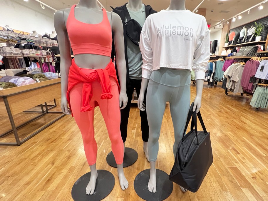 Two mannequins wearing lululemon clothing