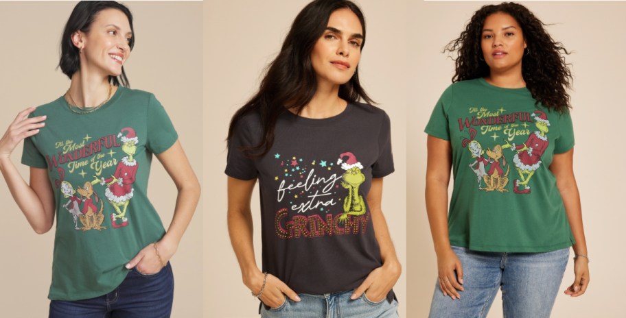 Three women wearing Grinch holiday tshirts.