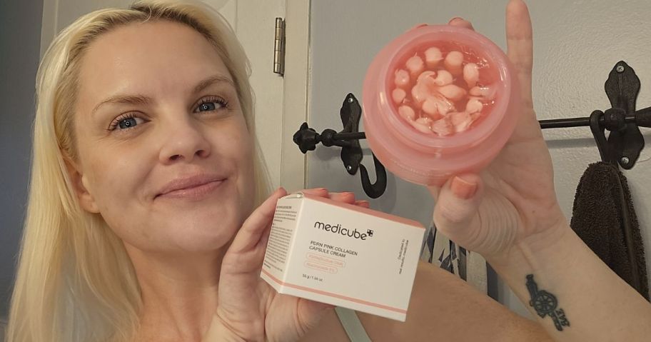 stefanie holding medicube Capsule Cream in bathroom