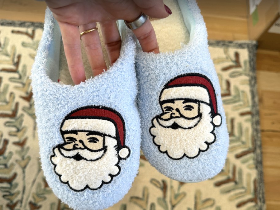 A pair of blue santa slippers.