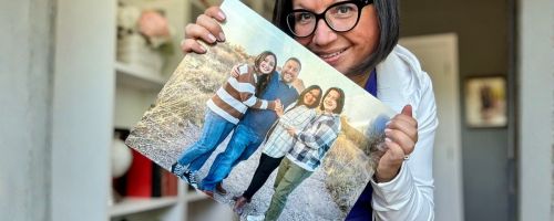 lina holding 11x14 metal phto print from walgreens