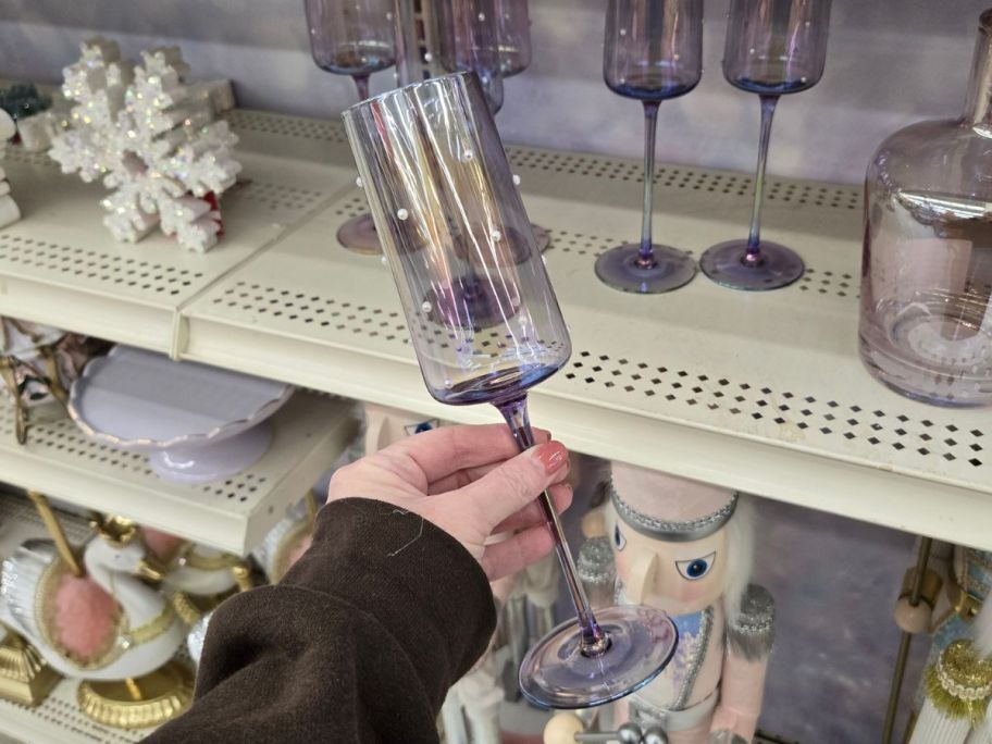Pink Glass Champagne Flute in hand in store