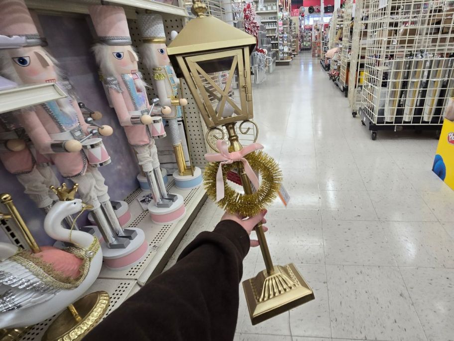 Gold Street Lamp in hand in store
