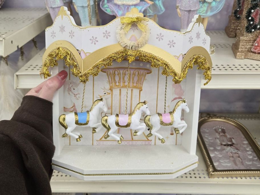 Carousel Tabletop Décor  in hand in store
