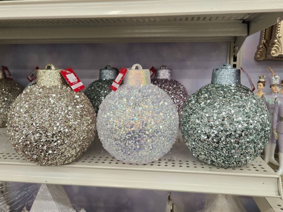 Glitter Ball Ornament Tabletop Décor on shelf in store