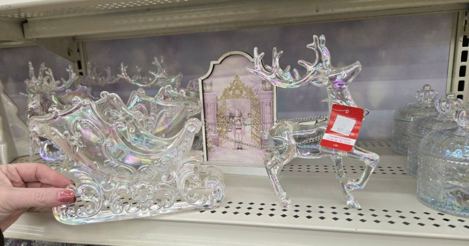 Sleigh & Reindeer Acrylic Tabletop Décor on shelf in store