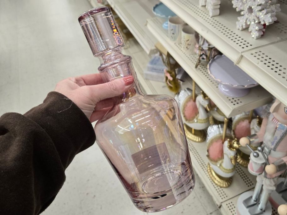Pink Glass Decanter in hand in store