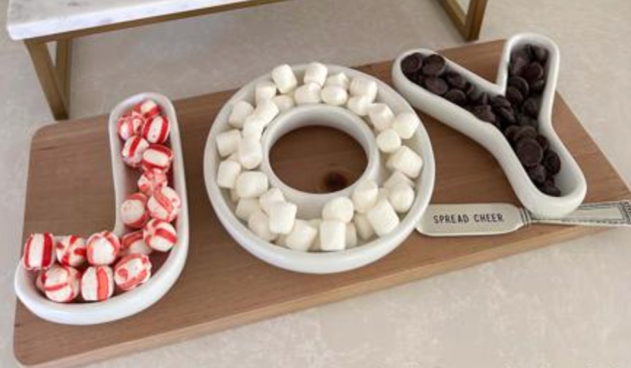 JOY shaped dishes with hot cocoa toppings