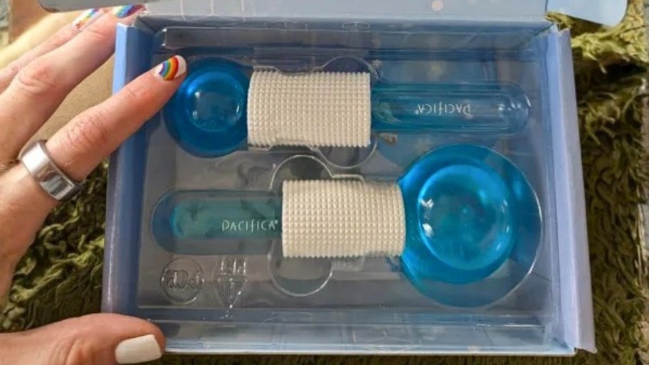 a box with two facial ice globes 