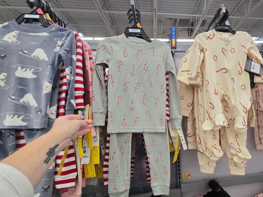 Carter's Child of Mine Toddler Pajama Set with candy canes on it in store