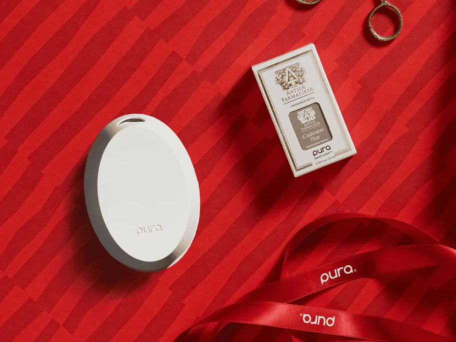 Pura Ultimate Hostess Set w/ 1 Fragrance on red tablecloth