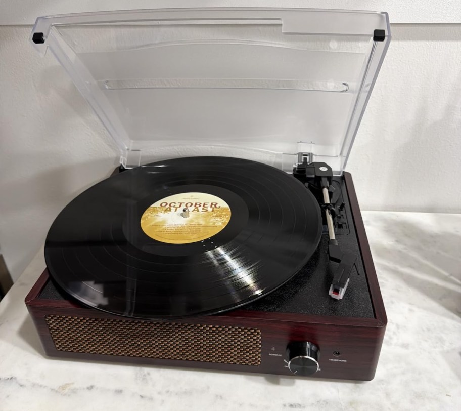 close up of record player on marble table