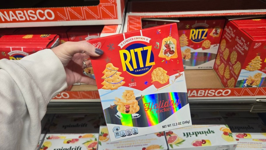 hand holding ritz crackers box in store