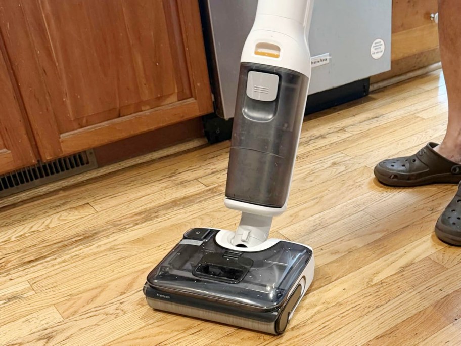 white and black vacuum in kitchen 