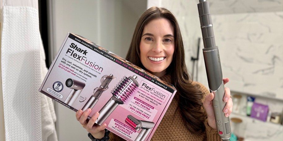 woman holding shark flexfusion box and styler