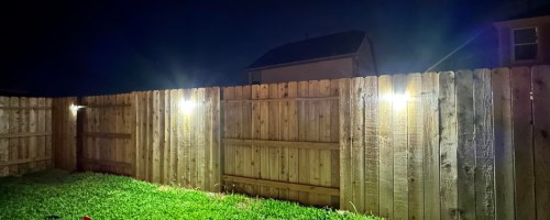 solar lights on a fence
