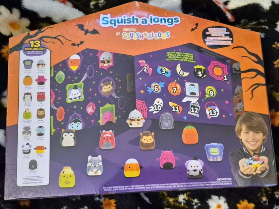 Halloween squish advent calendar on top of the bed