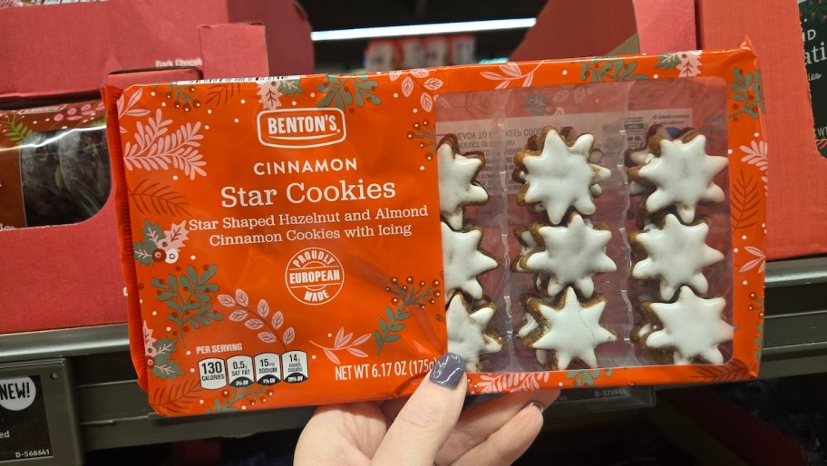 hand holding pack of star cookies
