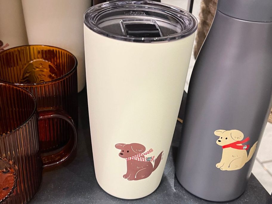 Holiday Puppy Tumbler on shelf in store