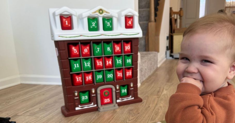 baby smiling in front of step2 My First Advent Calendar