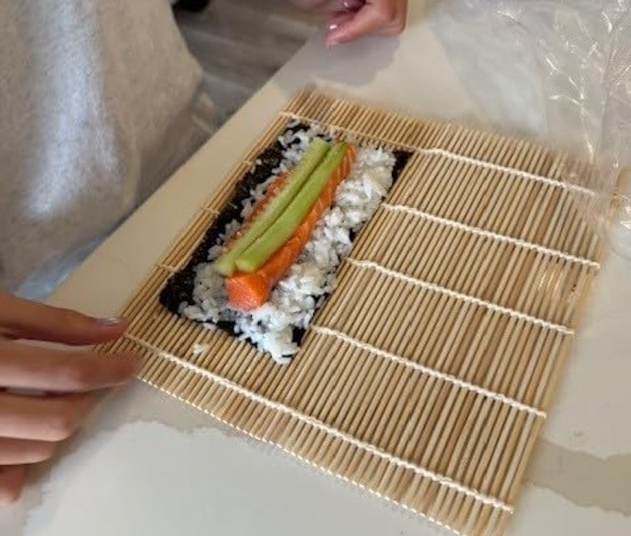 close up of bamboo sushi rolling kit on counter