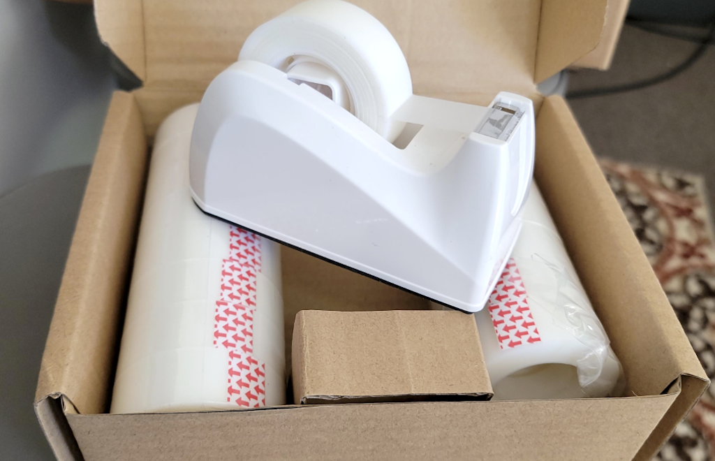 Amazon Basics Tape Dispenser w/ 16 Refill Rolls Just $6.44 (Stock Up for Christmas)