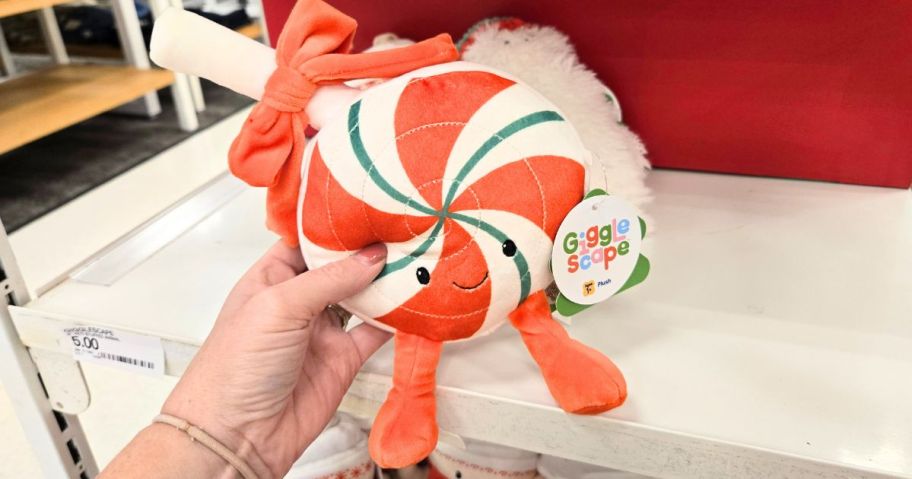 hand holding Gigglescape Mini Peppermint Lollipop Plush